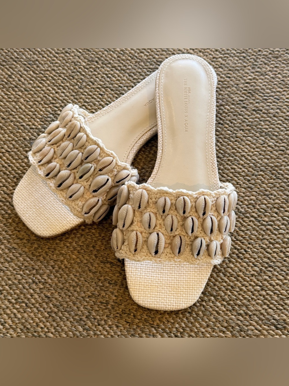 Aqua x The White Lotus collab shell sandals